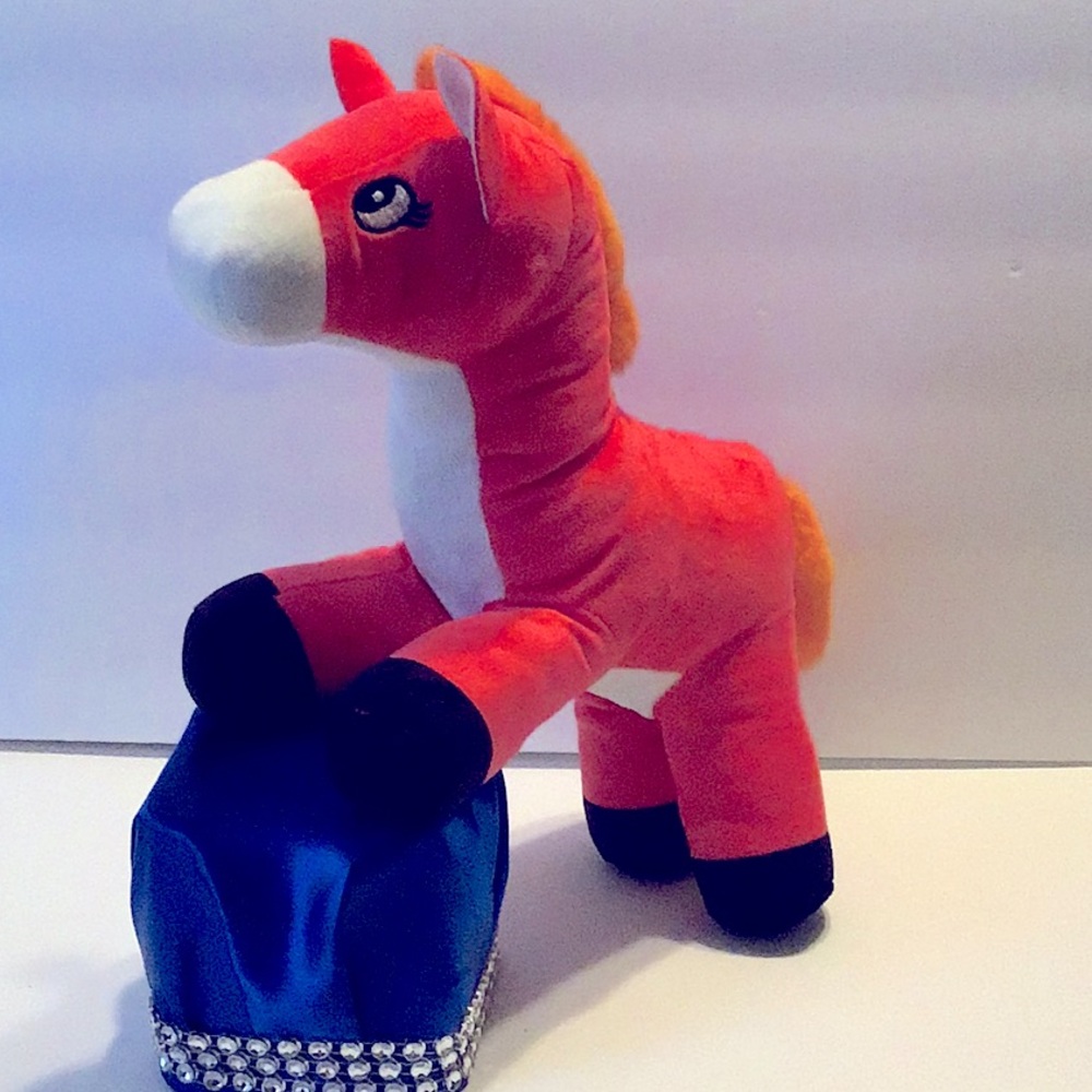 Orange pony coping/mechanism, stuffed animal